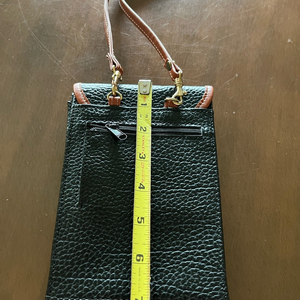 Dooney & Bourke Black and Brown Crossbody Bag.
I am not sure if a true Dooney. - Picture 4 of 5